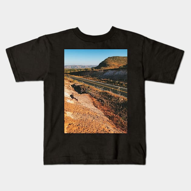 Road Through Brazilian National Park (Chapada dos Veadeiros) Kids T-Shirt by visualspectrum